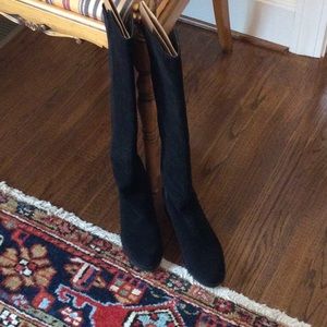 Black all weather knee high boots